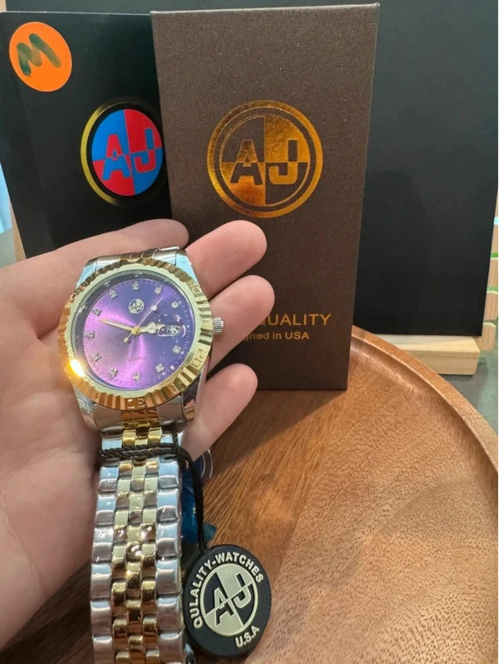 AJ purple face, gold & silver toned watch, stainless steel